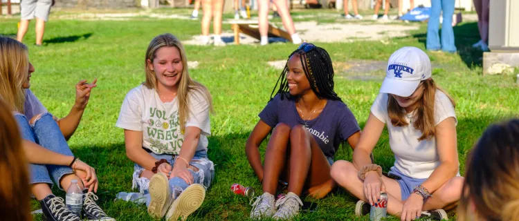 New UK students in the CAFE Living Learning Program gather for a picnic bonfire at South Farm.