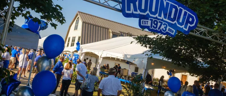 People gather at the 50th anniversary of the UK Martin-Gatton CAFE Roundup celebration.