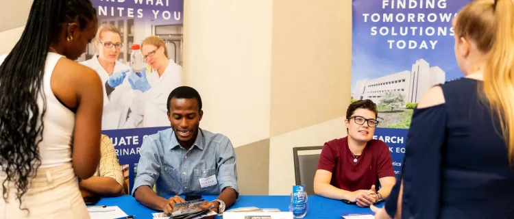 At the Kentucky Signature Industries Career Fair, students talk to employers from the bourbon and equine industries.