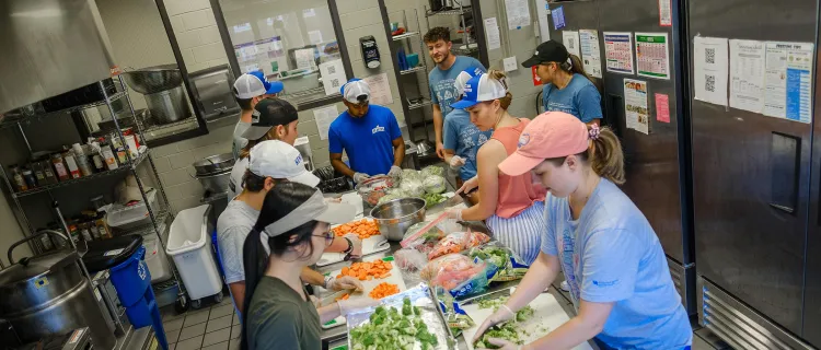 Students prepare food in the Campus Kitchen
