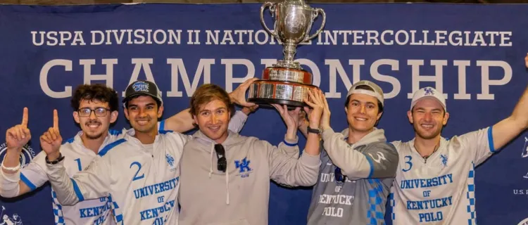 UK Wildcat Polo Club members hold a trophy after winning the DII men's national intercollegiate championship
