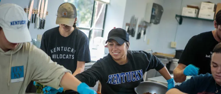 Students plate salads at The Lemon Tree