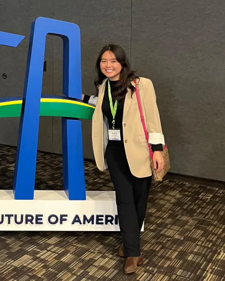 Audrey Wirasatki with an Agriculture Future of America display