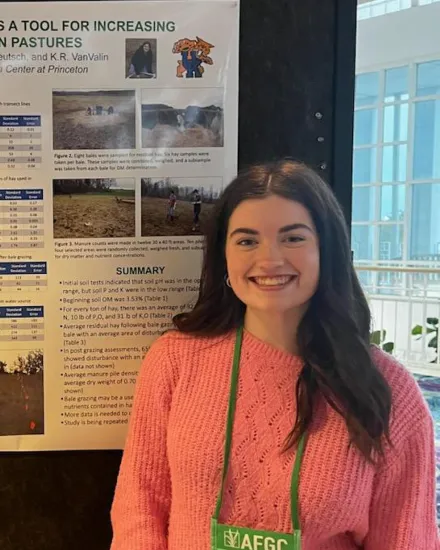 Whitney Peck with a presentation board
