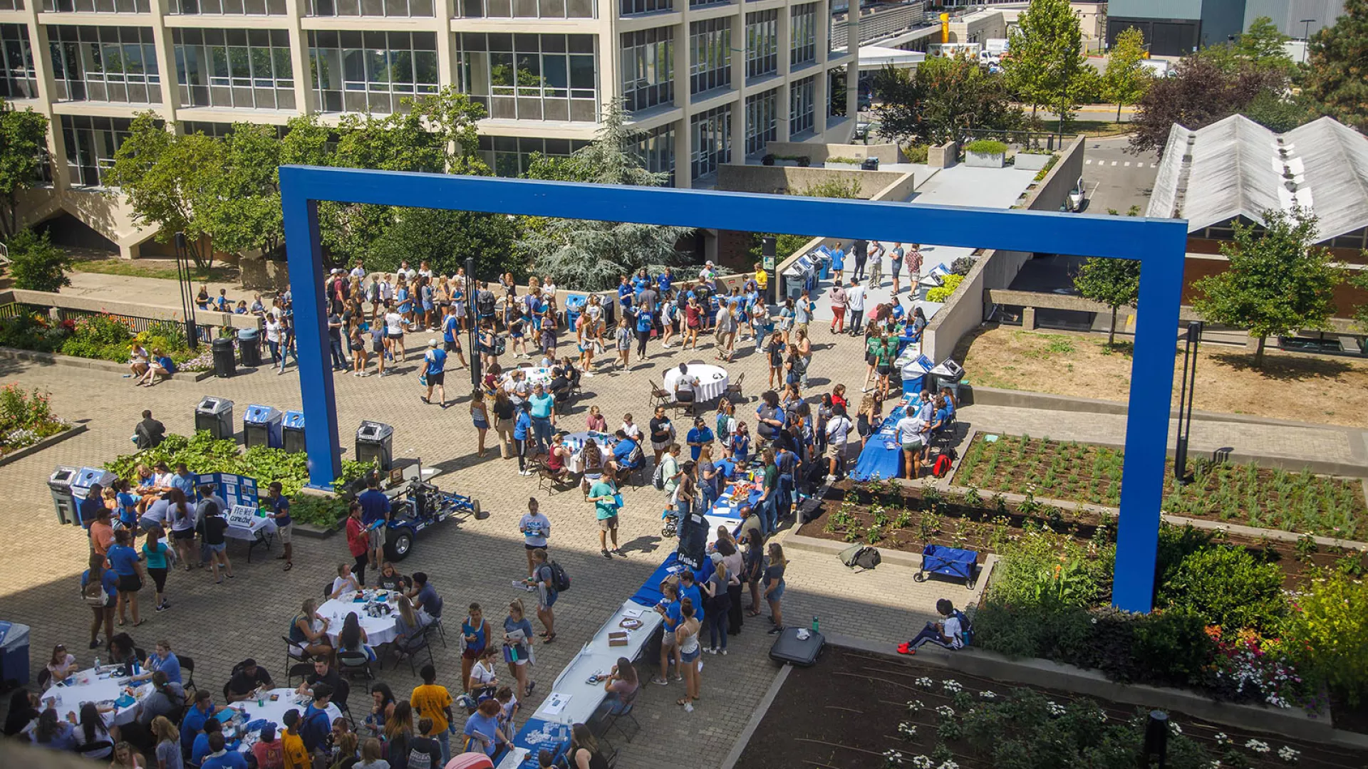Students gather outside alumni plaza