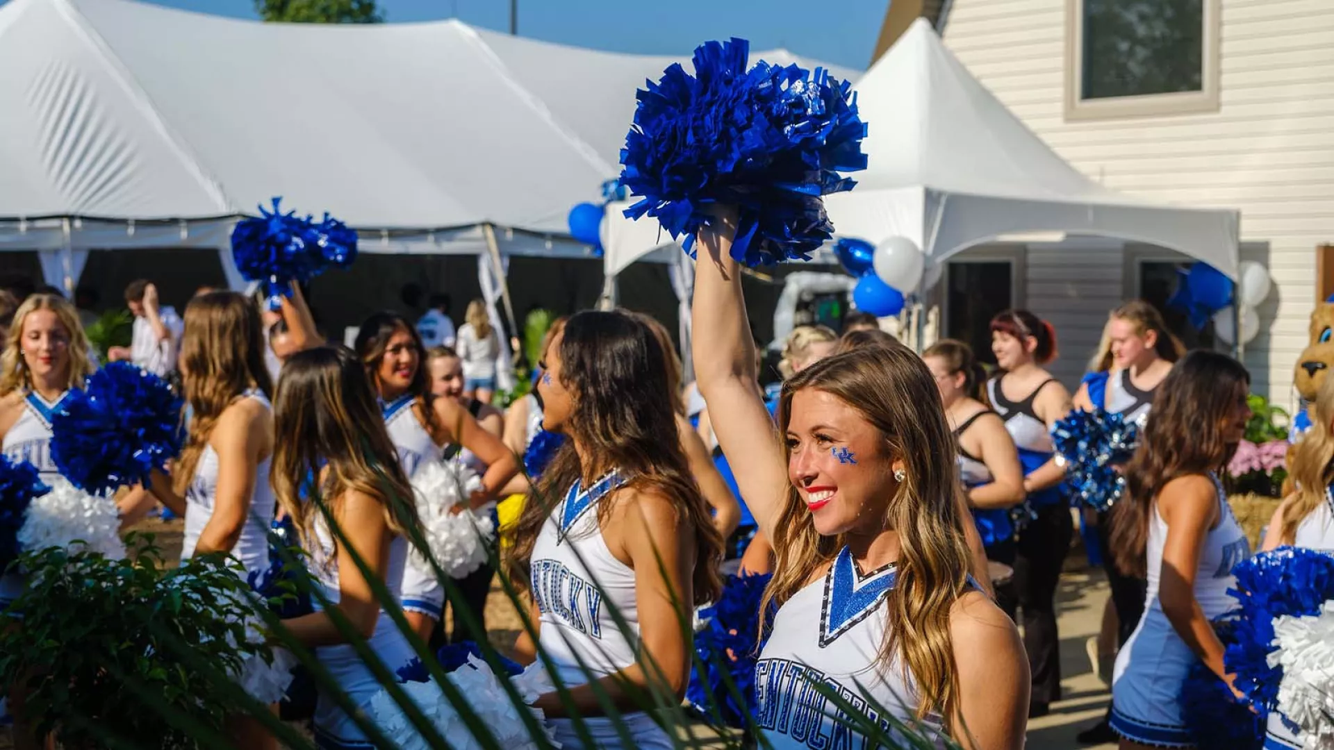 Cheerleaders cheer during the 50th anniversary of the UK Martin-Gatton CAFE Roundup celebration.