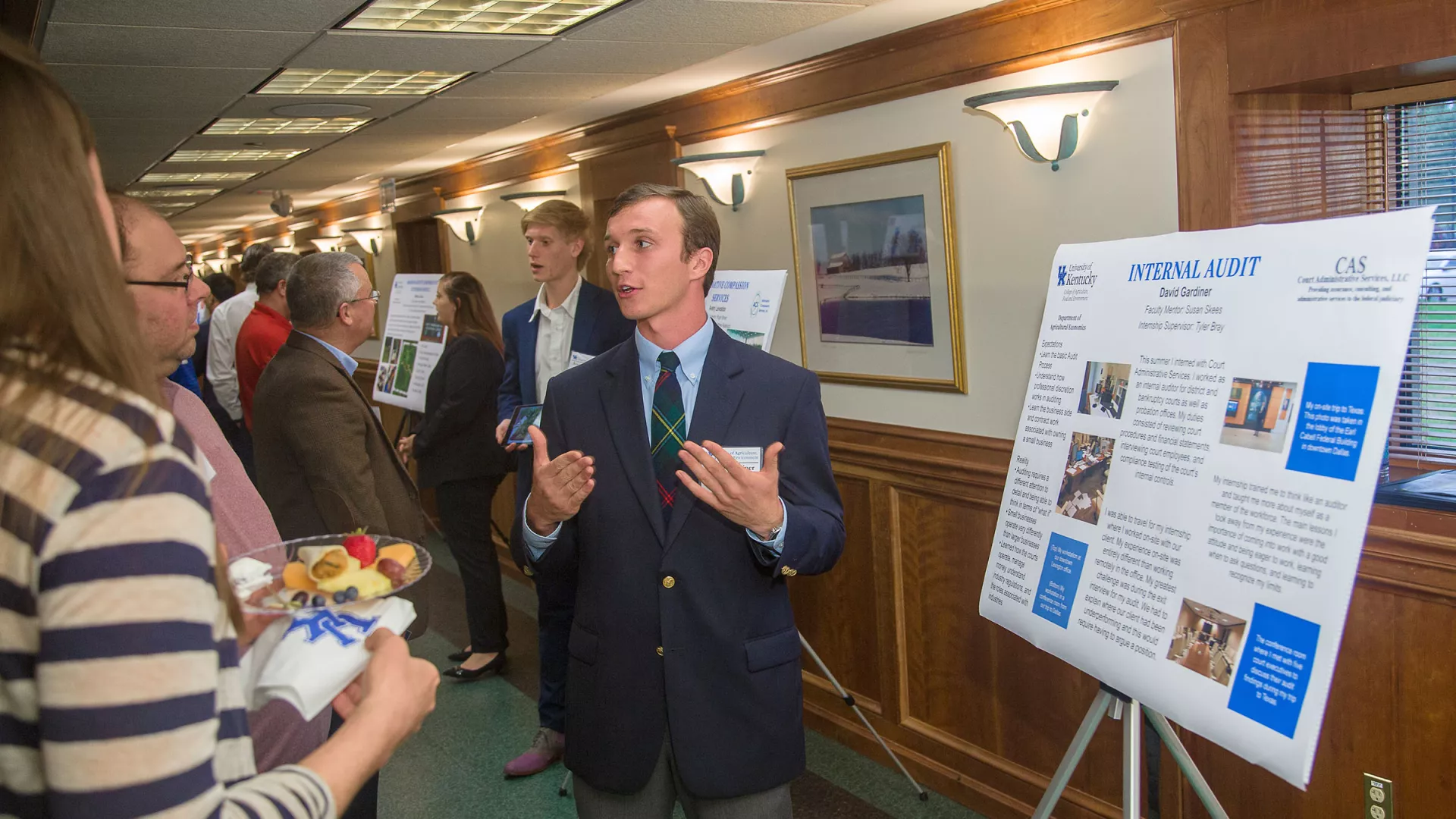 Agriculture Economics undergraduate students present posters at the AgEcon Symposium in the Good Barn.