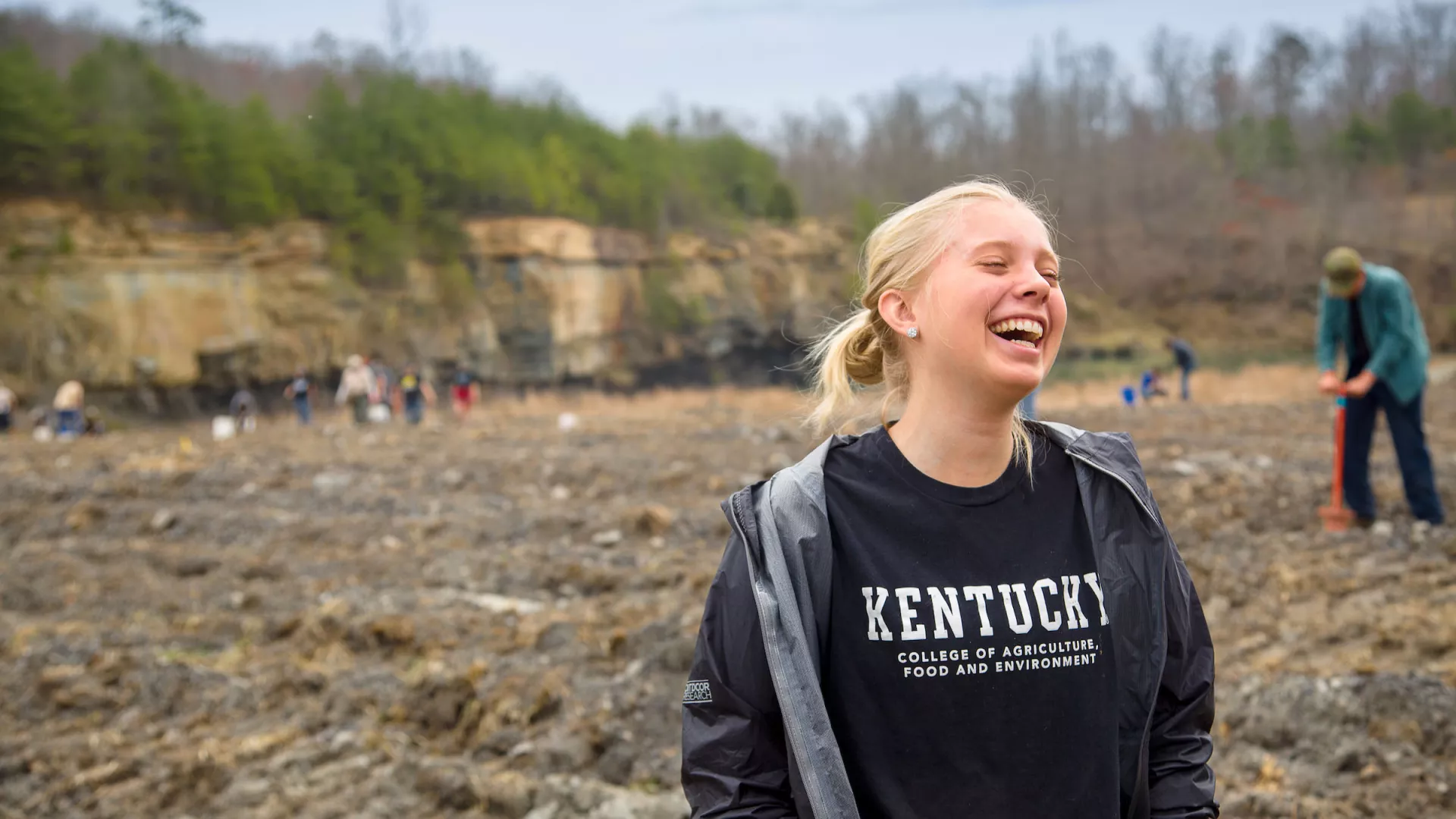 UK Foresty students teach Whitley County High School students best land management practices and help plant trees on reclaimed strip mine land.