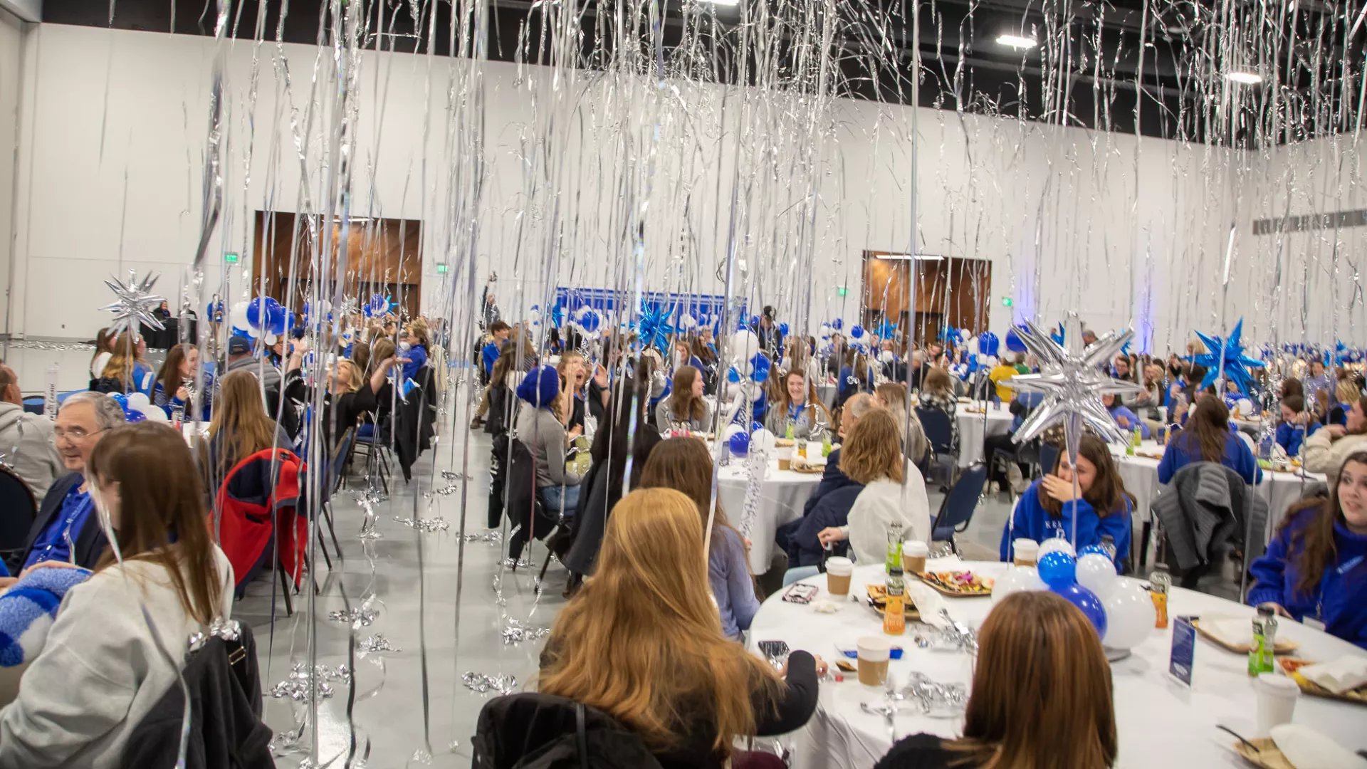 Streamers fall from the ceiling at the UK M-G CAFE Scholarship Brunch at the Central Bank Center.