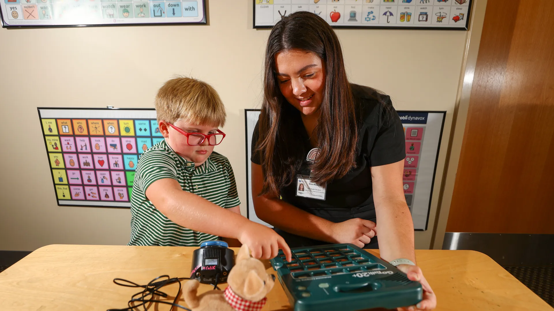 A student clinician helps a child with learning activities on July 16, 2024. Photo by Carter Skaggs | UKphoto