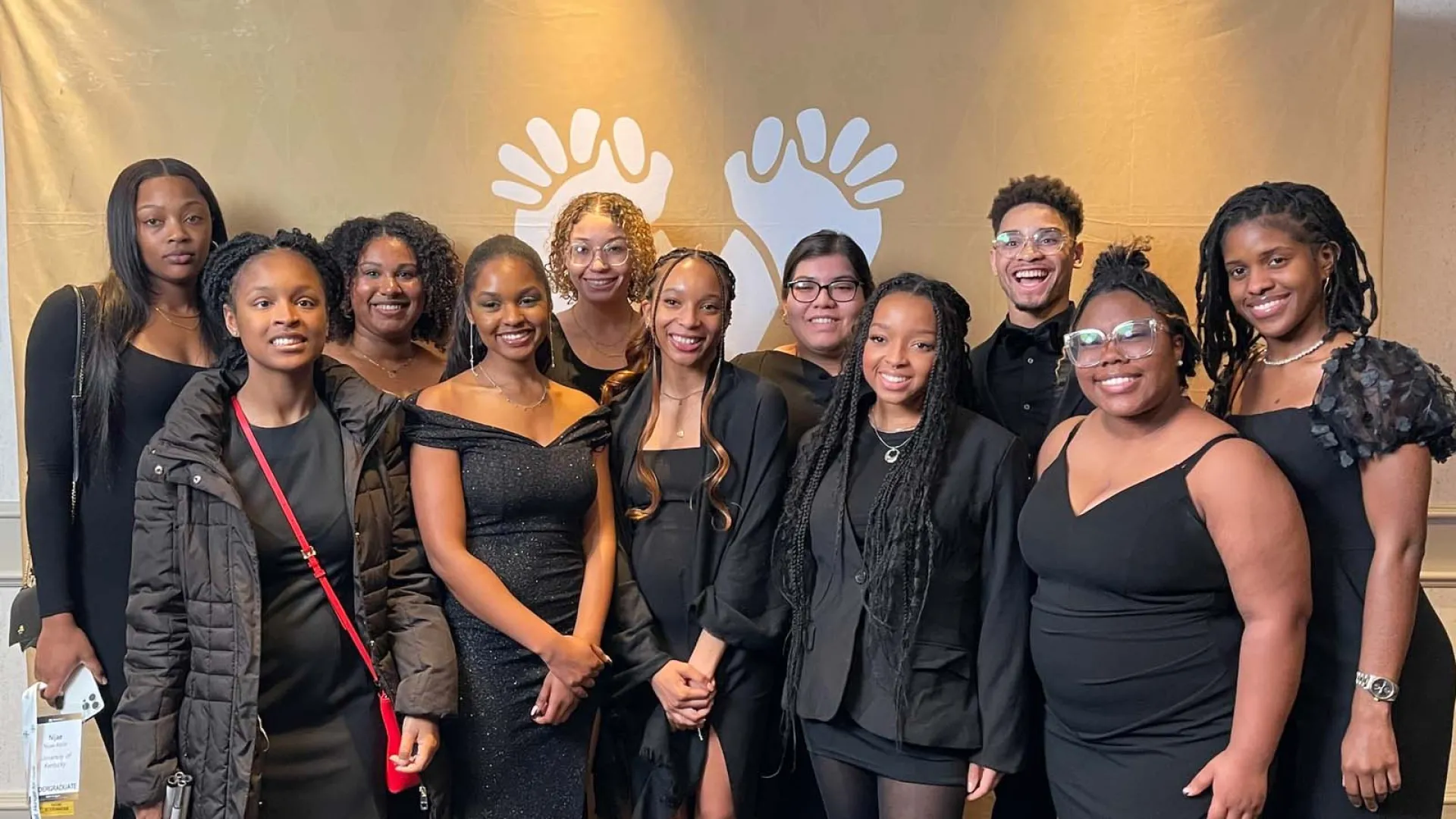 A group of people attend a MANRRS event