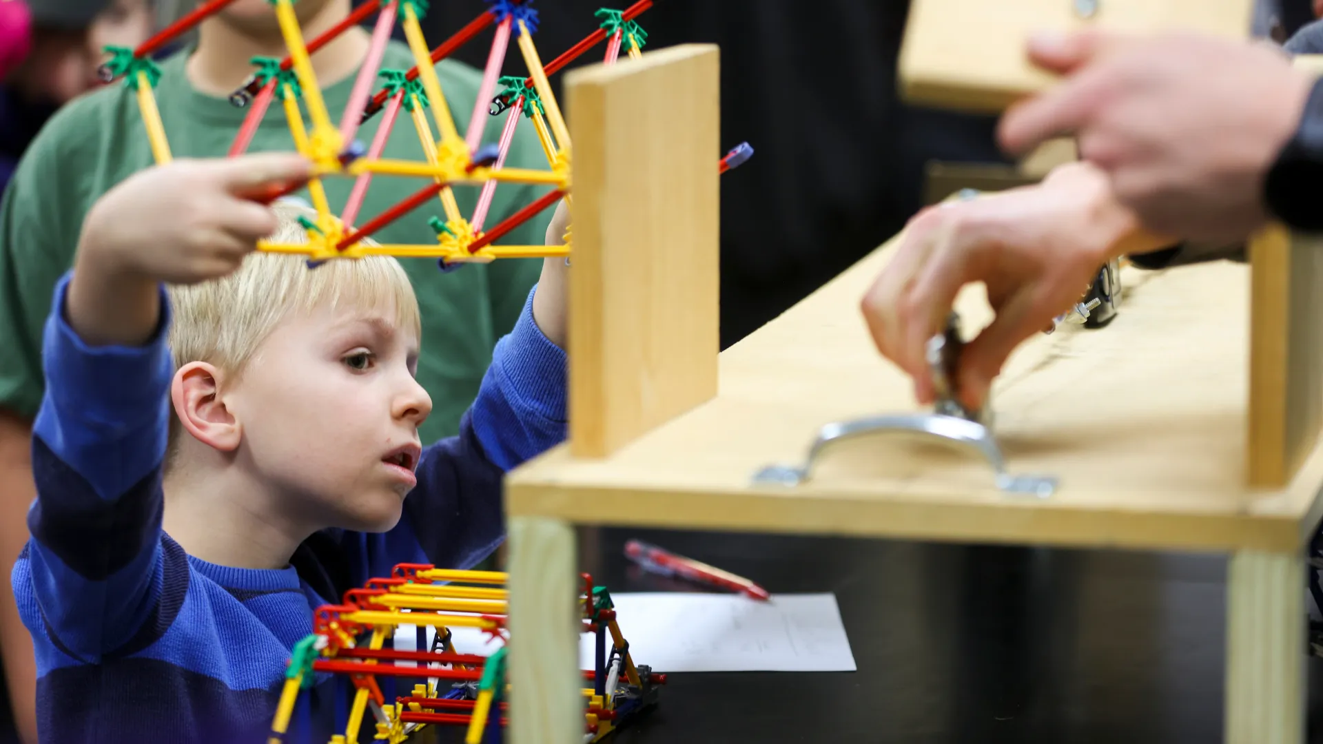 Families interact with the different hands-on exhibits at E-Day on Feb. 22, 2025. Photo by Carter Skaggs | UKphoto