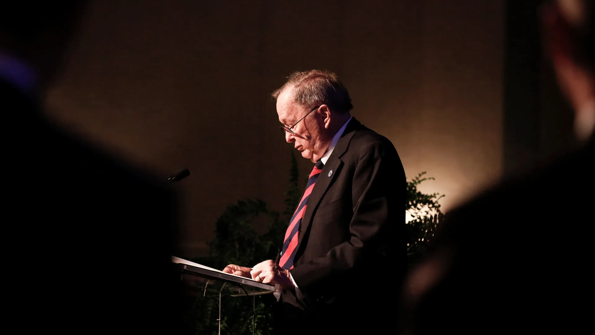 Bill Gatton speaks at a podium
