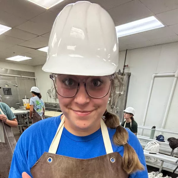 Veronica Trujillo wears a hardhat 