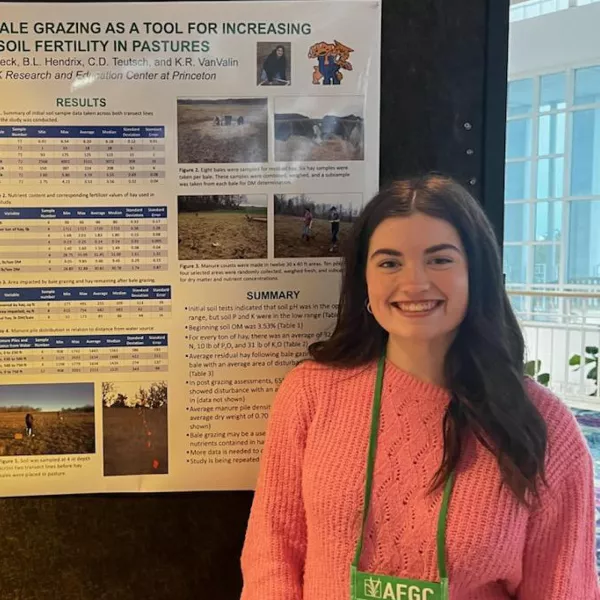 Whitney Peck with a presentation board