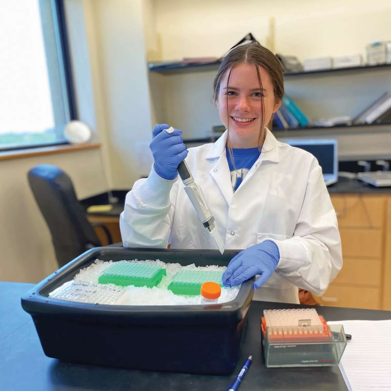 Gretchen Ruschman works in a lab