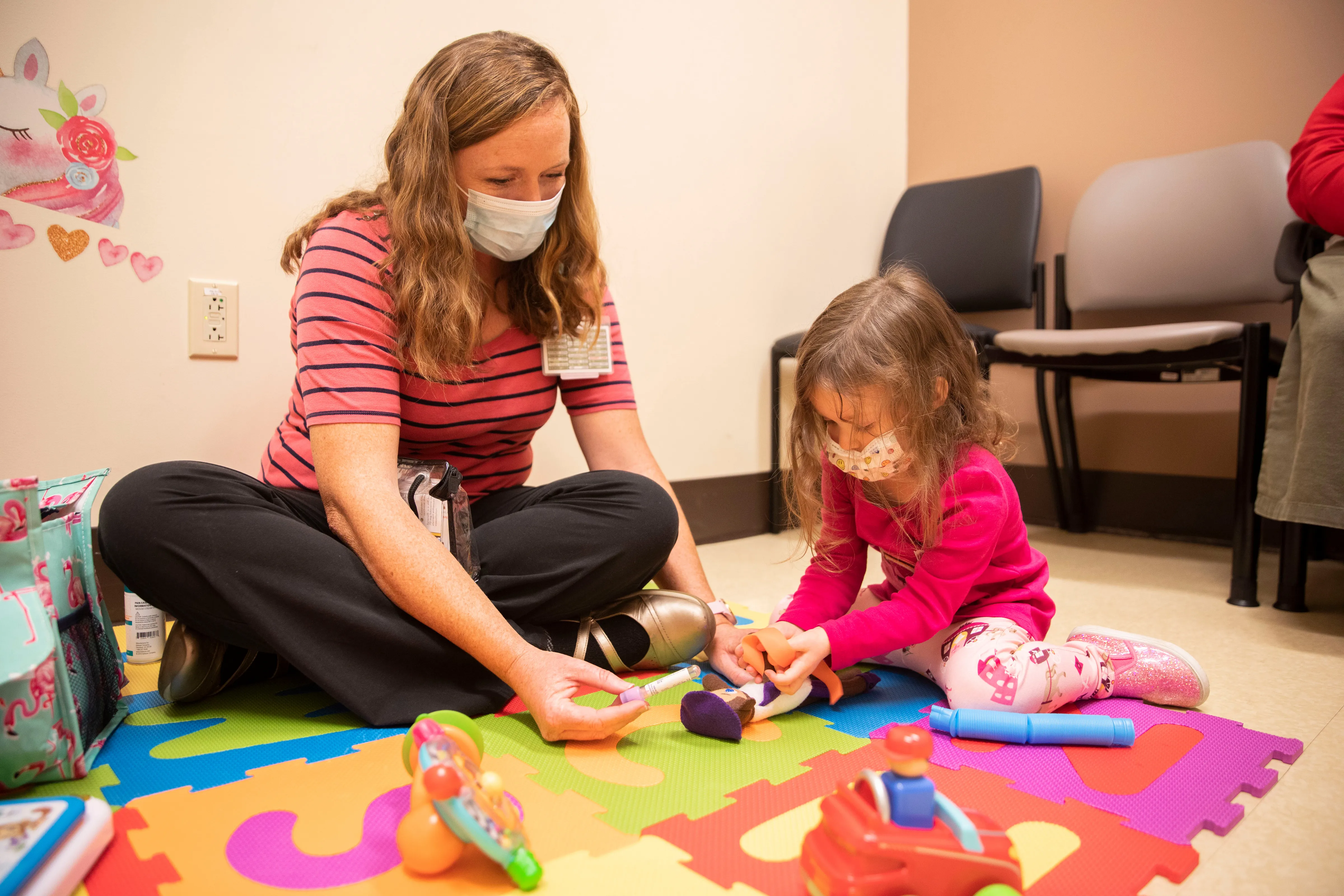 Child Life Specialist Emily Bollinger for a story on the pediatric vaccine clinic on December 3, 2021. Photo by Pete Comparoni | UKphoto