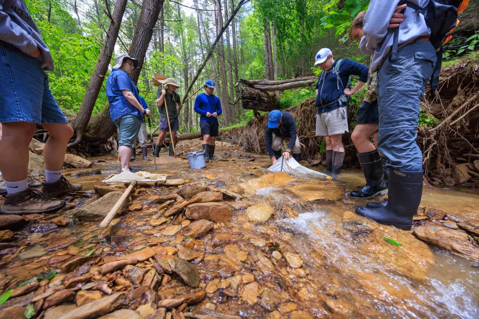 Aquatic Biologist Greg Pond led a group of NRES students in a creek survey inside Robinson Forest.